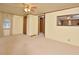 Cozy living room featuring a ceiling fan and doorway to a secondary room at 124 Jack Bennett Rd, Chapel Hill, NC 27517
