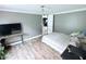 Cozy bedroom with neutral paint, modern floors, and ample space at 1404 N N Nc Hwy 87, Elon, NC 27244