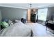 Comfortable bedroom with a soft gray color scheme and natural light at 1404 N N Nc Hwy 87, Elon, NC 27244