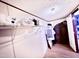 Walk-in closet with shelving and hanging storage and neutral walls at 1404 N N Nc Hwy 87, Elon, NC 27244