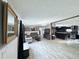 Spacious living room featuring hardwood floors and ample natural light at 1404 N N Nc Hwy 87, Elon, NC 27244