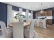 Bright open-concept kitchen and dining area featuring modern finishes and ample natural light, creating an inviting atmosphere at 1516 Tamarisk Ln, Durham, NC 27703