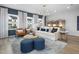 Inviting living room filled with natural light, featuring modern decor, comfortable seating, and stylish accents, ideal for relaxation at 1516 Tamarisk Ln, Durham, NC 27703