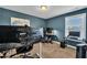 Dedicated office space with modern monitors, offering an ideal setup for work or gaming at 175 Steep Rock Dr, Willow Springs, NC 27592