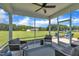 Inviting screened porch with comfortable seating and scenic views, perfect for outdoor relaxation and entertaining at 175 Steep Rock Dr, Willow Springs, NC 27592