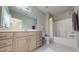 Bathroom featuring a gray vanity, neutral walls, and a toilet at 1880 Woodall Crest Dr, Apex, NC 27502