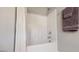 Neutral bathroom featuring a tub with shower curtain and a towel rack at 1880 Woodall Crest Dr, Apex, NC 27502
