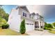 Beautiful two-story home with manicured lawn and attached garage at 1880 Woodall Crest Dr, Apex, NC 27502