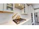 Well-equipped kitchen with stainless steel appliances, sleek countertops, and a modern gas cooktop at 1880 Woodall Crest Dr, Apex, NC 27502