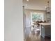 Open-concept kitchen and dining area with natural light, creating a seamless transition for cooking and entertaining at 1880 Woodall Crest Dr, Apex, NC 27502