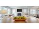 Living room with comfortable seating, a fireplace, and plenty of natural light at 1880 Woodall Crest Dr, Apex, NC 27502