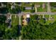 Aerial view of a newly constructed home with well-maintained landscaping and surrounding neighborhood at 205 Gentry St, Roxboro, NC 27573