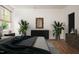 Bedroom interior with hardwood flooring, natural lighting and well appointed decor at 205 Gentry St, Roxboro, NC 27573
