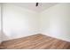 Clean, bright bedroom with wood floors, offering a blank canvas for personalization and comfort at 205 Gentry St, Roxboro, NC 27573