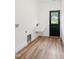 Laundry room featuring a utility sink and a door with window at 205 Gentry St, Roxboro, NC 27573