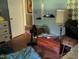 Bedroom with hardwood floors, a nightstand and vintage lamp at 2306 Cool Springs Rd, Sanford, NC 27330
