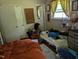 Bedroom featuring a full bed, a side bed, and windows at 2306 Cool Springs Rd, Sanford, NC 27330