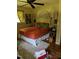 Bedroom featuring a large bed, hardwood floors, and decor at 2306 Cool Springs Rd, Sanford, NC 27330