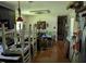 Open floor plan showing the kitchen and dining area with hardwood floors and natural light at 2306 Cool Springs Rd, Sanford, NC 27330
