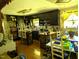 Unique kitchen featuring a combination of dark cabinets and a wooden island at 2306 Cool Springs Rd, Sanford, NC 27330