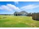Wide backyard featuring a well-maintained lawn, offering a great space for outdoor activities and relaxation at 25 Harlow Ct, Fuquay Varina, NC 27526