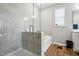 Beautiful bathroom showcasing a glass shower, soaking tub, and modern tile work at 25 Harlow Ct, Fuquay Varina, NC 27526
