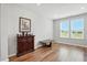 Versatile living space with hardwood floors, modern lighting, and neutral decor at 25 Harlow Ct, Fuquay Varina, NC 27526