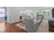 Open-concept living room with hardwood floors, stylish furniture, and lots of natural light at 2511 Range Overlook Xing, Apex, NC 27523