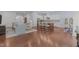 Open-concept living room and kitchen with hardwood floors and modern design at 2511 Range Overlook Xing, Apex, NC 27523