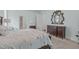 Serene main bedroom boasts a tray ceiling, deck access, and a calming color palette at 2511 Range Overlook Xing, Apex, NC 27523