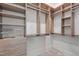 Spacious walk-in closet featuring custom built-in shelving, drawers, and ample storage space at 2511 Range Overlook Xing, Apex, NC 27523