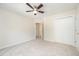 Bedroom with carpet, double door closet and ceiling fan at 2613 Sweet Gum Dr, Hillsborough, NC 27278