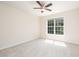 Bright bedroom with neutral walls, carpet, and a ceiling fan at 2613 Sweet Gum Dr, Hillsborough, NC 27278