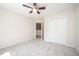 Bedroom with carpet, closet, and view of hall at 2613 Sweet Gum Dr, Hillsborough, NC 27278