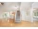Entry foyer with hardwood floors and staircase leading to the second story at 2613 Sweet Gum Dr, Hillsborough, NC 27278