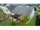Aerial view of the fenced backyard with a pergola covered patio and small garden at 326 Slate Dr, Gibsonville, NC 27249