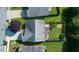 Aerial view of backyard, greenhouse, lawn, garden, and patio at 326 Slate Dr, Gibsonville, NC 27249