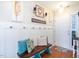 Inviting entryway with bench, decorative pillows, and coat hooks at 326 Slate Dr, Gibsonville, NC 27249