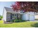 A partially obscured view of the front of a single-Gathering home at 326 Slate Dr, Gibsonville, NC 27249