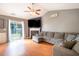 Cozy living room with hardwood floors, fireplace, and comfortable seating at 326 Slate Dr, Gibsonville, NC 27249