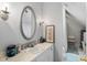 Bright bathroom vanity, decorative mirror and sconces at 3573 Northern Estates Cir, Rocky Mount, NC 27804