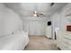 Spacious bedroom with ceiling fan, closets and white furniture at 3573 Northern Estates Cir, Rocky Mount, NC 27804