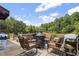 Spacious outdoor deck with comfortable seating and a fire pit, perfect for relaxing and entertaining at 3573 Northern Estates Cir, Rocky Mount, NC 27804