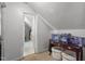 Hallway with access to bathroom featuring tiled floor and view to storage on table at 3573 Northern Estates Cir, Rocky Mount, NC 27804