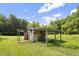 Outdoor shed on a well-maintained lawn with storage for tools and equipment at 3573 Northern Estates Cir, Rocky Mount, NC 27804