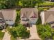 Inviting two-story home with a well-manicured lawn and a welcoming front porch, complemented by an extended driveway at 3806 Stoneybrook Dr, Durham, NC 27705