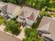 Well-maintained two-story home featuring a cozy front porch, surrounded by lush greenery and mature trees at 3806 Stoneybrook Dr, Durham, NC 27705