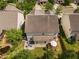 Private backyard oasis featuring a patio with comfortable seating and an outdoor umbrella over a wooden deck at 3806 Stoneybrook Dr, Durham, NC 27705