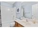 A standard bathroom featuring a tub, toilet and a sink at 3806 Stoneybrook Dr, Durham, NC 27705