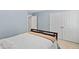 A standard bedroom with a full bed, closet and door at 3806 Stoneybrook Dr, Durham, NC 27705